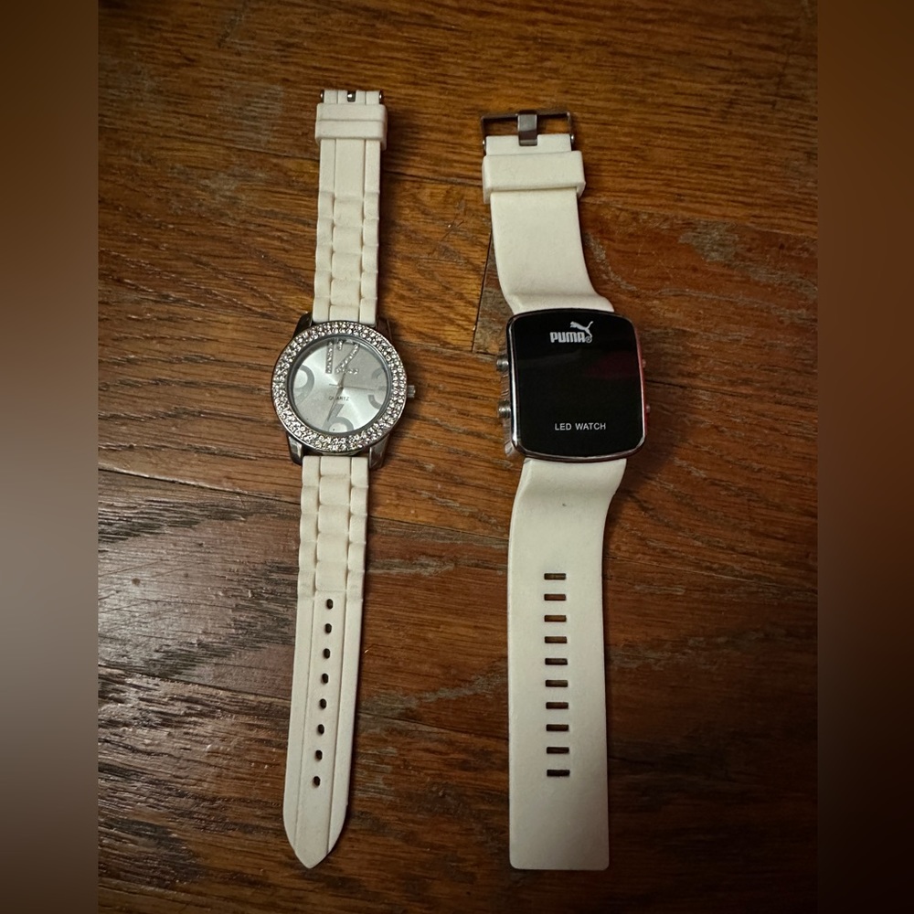 White puma watch and a white gem watch